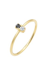 Goldring mit zwei Steinen: einem schwarzen runden Stein und einem klaren runden Stein, auf einem dünnen, glatten Band eingesetzt. Mit dem Feinheitsstempel "375."