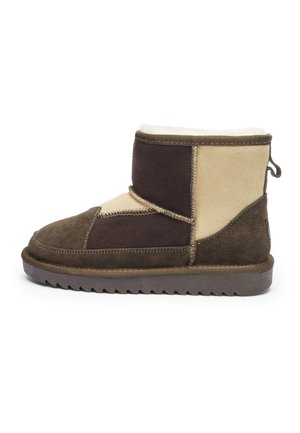 Brown and beige suede ankle boot with visible stitching, pull tab, fluffy inner lining, and ridged rubber sole, shown in side profile.