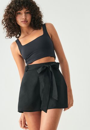 SÁVEL TILLY  - Shorts - black