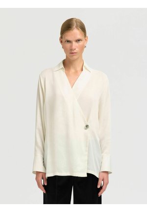 ASYMMETRISCHES - Blouse - gardenia