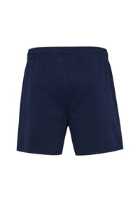 Calções de algodão azul-marinho com um cós elástico, apresentando um design simples e uma textura suave, sem padrões ou detalhes visíveis.