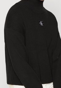 Calvin Klein Jeans Stickad tröja - black