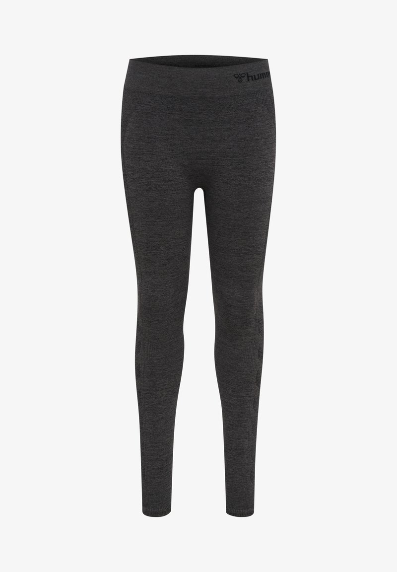 Svarta leggings i ett töjbart, strukturerat tyg. Har en bred elastisk midjeband med logotyp nära toppen. Figurnära design.