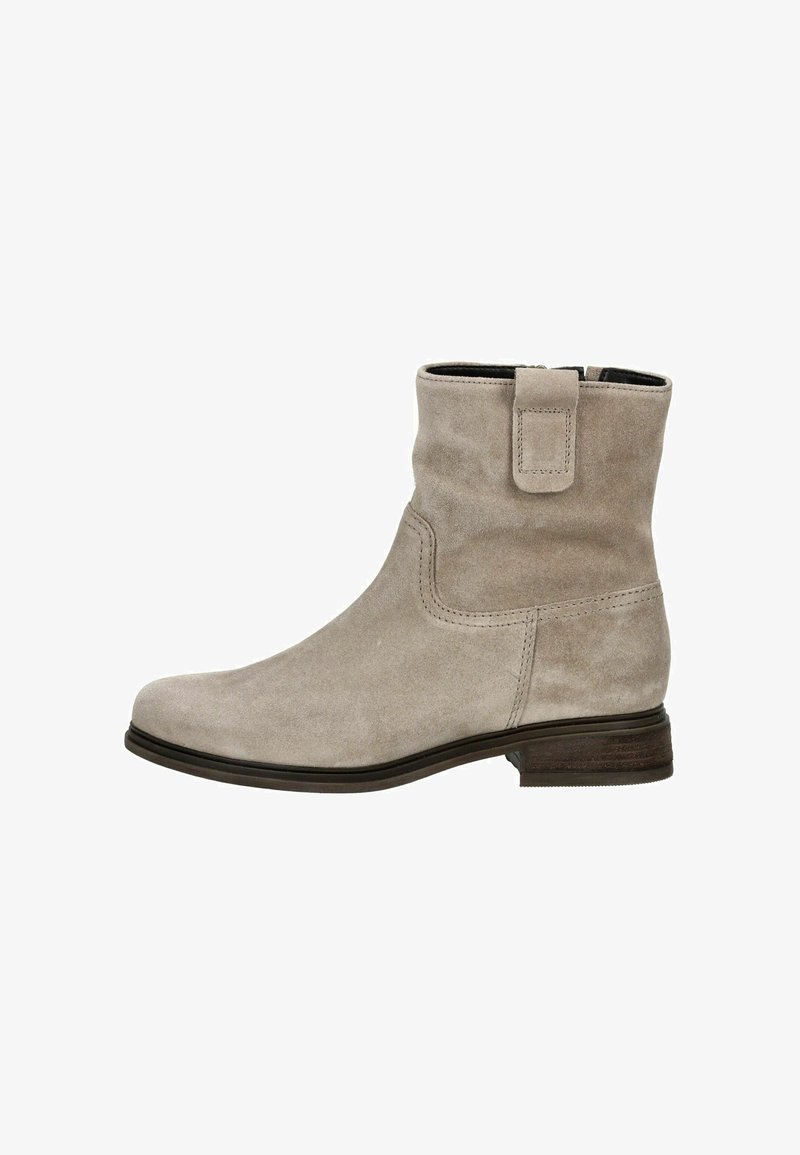Bottines en suède beige clair avec une texture lisse, un bout arrondi, un petit talon et des détails cousus. Comprend une boucle pour un enfilage facile.