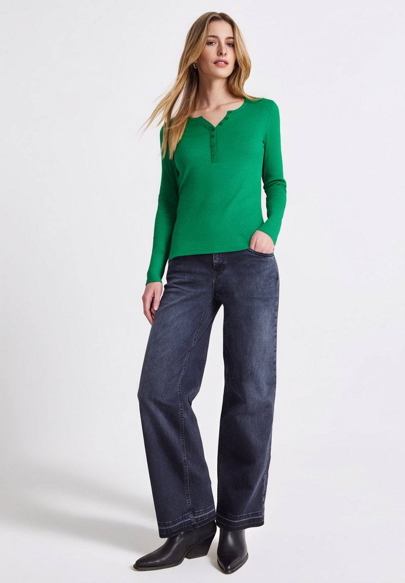 SHEIN Frenchy Taglie Forti Abo a maglietta con zip in maglia a coste | SHEIN ALIA