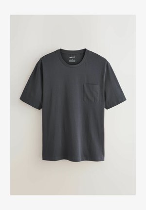 Tumehall puu-särgid lühikeste varrukatega, ümar kaelus ja vasakul küljel rinnakott. Tavalise lõikega disain.