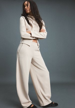 Stradivarius, SOFT-TOUCH BARREL JOGGER TROUSERS - Pantalon de survêtement - mottled dark brown