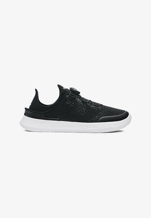 Black athletic shoes with a textured mesh upper, white sole, and a dial fastening system. Features ventilation holes and a sleek design.