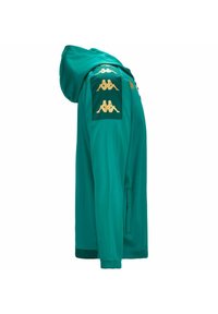 Felpa teal con chiusura a zip, caratterizzata da toppe di tessuto sulle spalle che mostrano loghi dorati. Texture liscia con una forma rilassata.