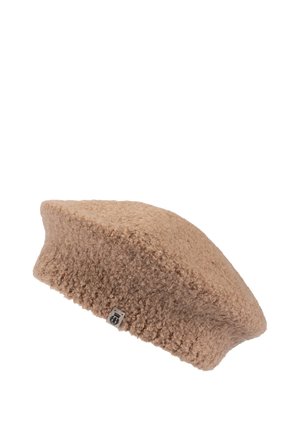 Beige textured wool beret with a small fabric logo tag on the brim, isolated on a white background.