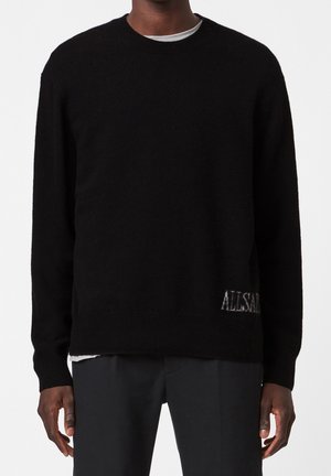 Stickad tröja - black