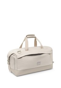 Beige Duffelbag mit glatter Stoffoberfläche, stabilen Traggriffen, einer vorderen Reißverschlusstasche und einem verstärkten Boden für Langlebigkeit.