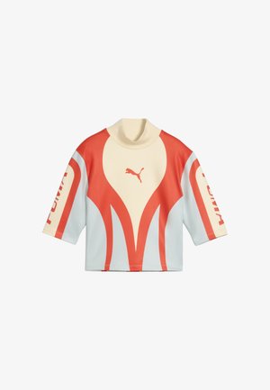 Krótki rękaw, sportowy top z wysokim kołnierzem w kremowym i pomarańczowym kolorze z logo Puma z przodu oraz napisem Puma na rękawach.