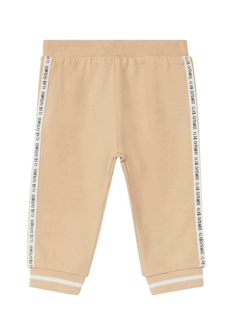 Beige sweatpants met een zachte textuur, featuring witte strepen aan de zijkanten met de tekst "CLUB CITENESS". Elastische tailleband en boorden.