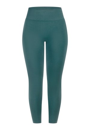 Leggings bleu sarcelle fabriqués dans un tissu extensible et lisse. Taille haute, coupe ajustée, longueur chevilles sans coutures visibles ni motifs.
