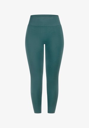 Leggings bleu sarcelle fabriqués dans un tissu extensible et lisse. Taille haute, coupe ajustée, longueur chevilles sans coutures visibles ni motifs.