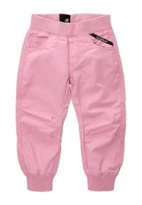 Różowe dresowe spodnie z bawełny z elastycznym paskiem, bocznymi kieszeniami i ściągaczami na końcach nogawek. Zauważalne detale w szyciu podkreślają design.