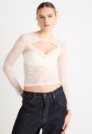 Hosszú ujjú felső - creme