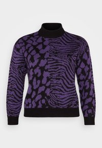 Lila und schwarze Strickjacke mit einem Stehkragen, die ein Muster aus abstrakten Formen und Streifen auf der Vorderseite und den Ärmeln aufweist.