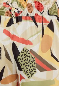 LELA LOOSE FIT - Trousers - yellow