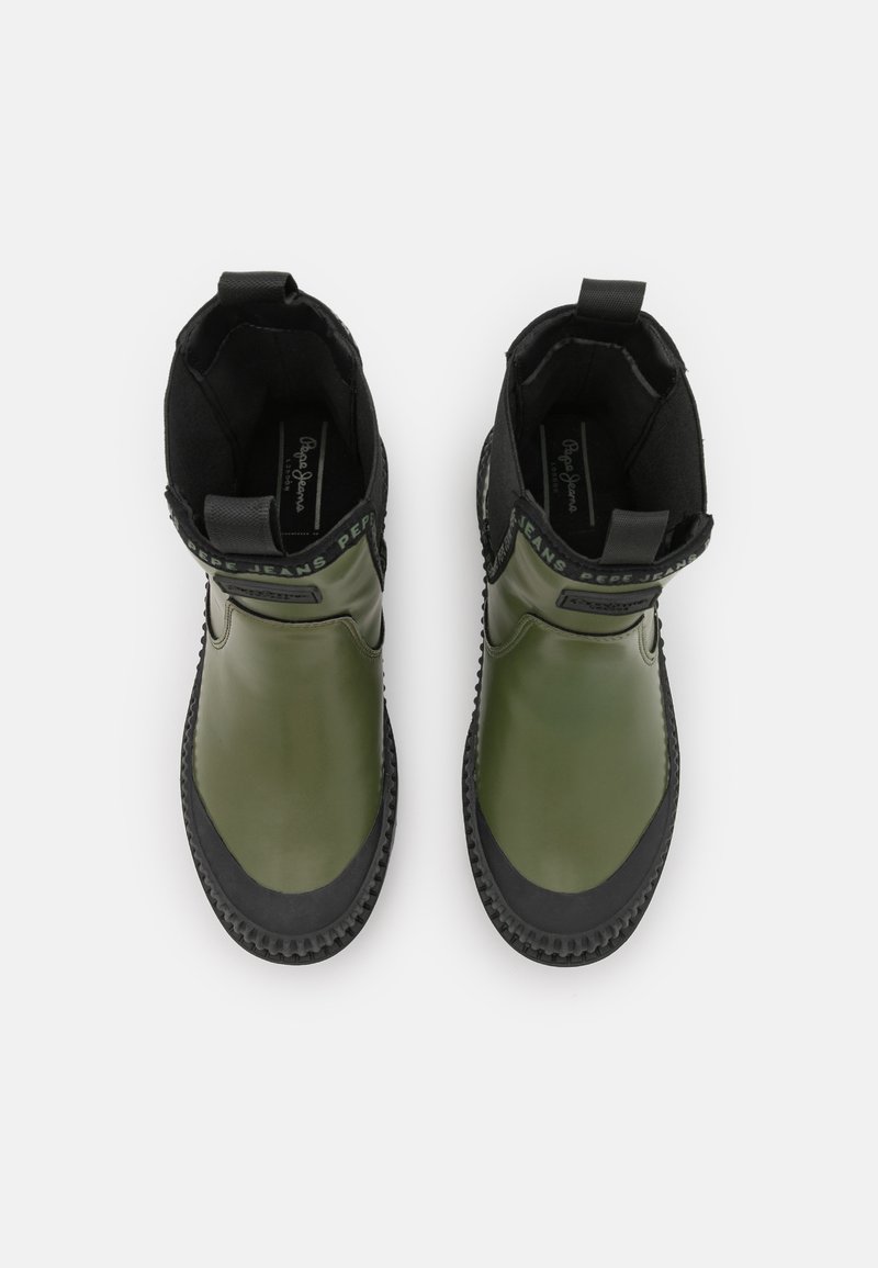 Jeans CHELSEA Botas de - green/caqui - Zalando.es