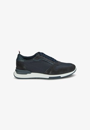 Navy athletic shoe featuring a combination of mesh and suede materials, lace-up front, and a white cushioning sole with textured accents.
