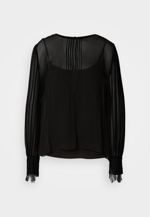 Black chiffon blouse with sheer long sleeves, pleated bodice, and lace cuffs. Round neckline with a button closure at the back.