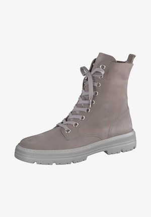 Botte haute grise claire à lacets avec semelle en caoutchouc et œillets métalliques, conçue pour un usage décontracté ou en plein air.