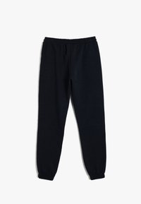 Svarta sweatpants i mjuk tyg, med elastisk midja och muddar, med rak ben-design och utan synliga mönster eller accenter.
