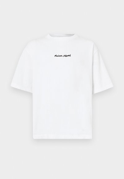 White cotton t-shirt with short sleeves, featuring a black "Maison Kitsuné" logo stitched on the front, round neckline, and straight cut.