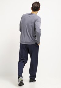 Nike Performance Kalhoty - blue
