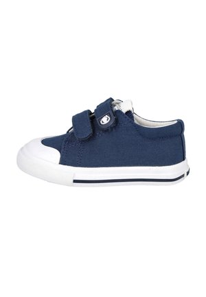 Zapatilla para niño en azul marino con puntera de goma blanca, dos tiras ajustables de velcro y suela blanca con franja azul marino.