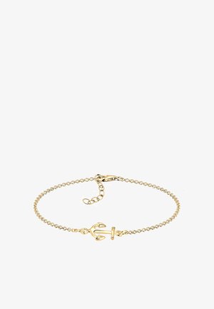 Arany lánc karkötő középső horgony dizájnnal, homár kapoccsal és állítható hosszal. Simább textúra és fényes felület.