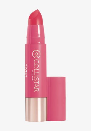 Pink twist-up lip product with a pointed tip, shiny finish, and gold branding on the casing; metal base for secure closure.