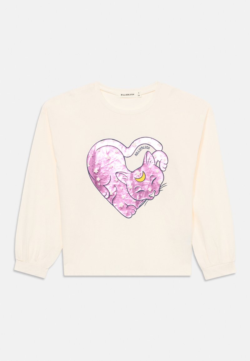 Kremfarget langermet bomullstopp med et rosa kattegrafikk i hjerteform, med en måneakcent på kattens panne.