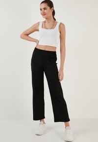 LELA REGULAR FIT - Hlače - black