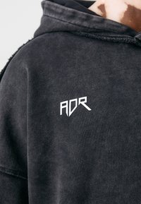 Atelier de roupa LOGO HOODIE UNISEX - Kapucnis pulóver - black