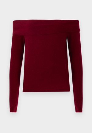 Bordeaux off-the-shoulder sweater med lange ærmer, ribbet tekstur og boxy form. Fremstillet af et blødt, strækbart materiale.