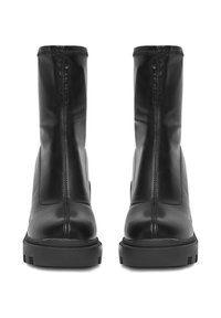 Melnas ādas potītes zābaki ar gludu virsmu, elastīgām sānu daļām, noapaļotu purngalu un masīvu melnu zoli.