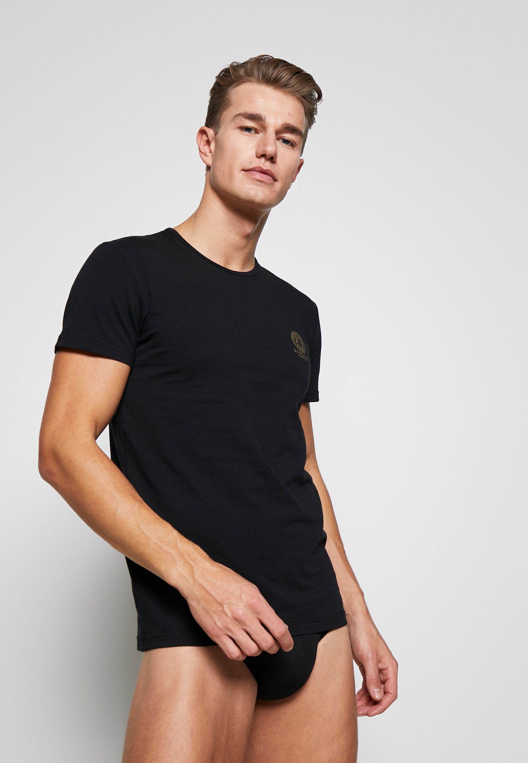 T-shirt con stampa regalia barocca bianco da uomo a manica corta firmata  versace jeans couture - VERSACE JEANS COUTURE - Pavidas