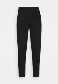 Black trousers with a fitted design, tapered legs, and a button closure. Features clean lines and a smooth, matte texture.