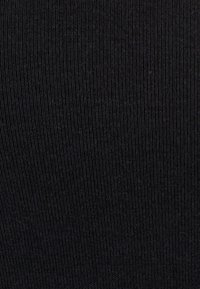 Damart MANCHES COURTES THERMOLACTYL SENSITIVE - Maglietta intima - noir