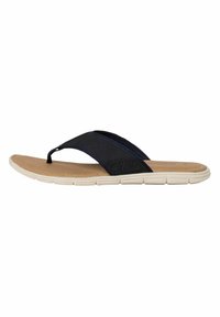 Tumesin värvi flip-flop sandaalid tekstureeritud rihmaga, beeži jalatallaga ja valge kummist tallaga, millel on paindlikkuse tagamiseks segmenteeritud mustrid.