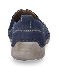 Navy blue leather slip-on shoe with a textured, tan rubber sole; visible stitching along the edges; rounded back design.