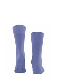 Calzini viola realizzati in un materiale liscio e elastico. Presentano un polsino a costine e un brand minimale sul lato.