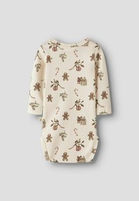 Kremowy bodysuit dla niemowląt z długimi rękawami, ozdobiony wzorem z piernikowymi ludzikami, laskami cukrowymi, ostrokrzewem, pudełkami prezentów i ozdobami świątecznymi.