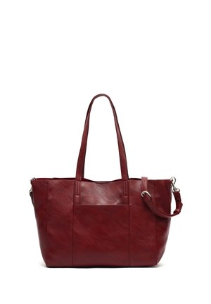 Red leather tote bag with dual handles, a detachable shoulder strap, and a front pocket. Smooth texture and structured shape.