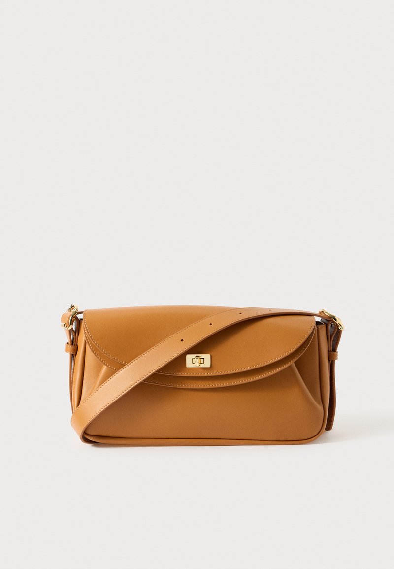 Brown leather crossbody bag with a curved flap, gold-toned hardware, and a detachable strap. The surface is smooth with minimal stitching.