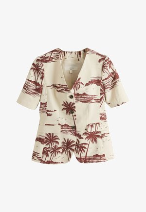 Blazer corto a maniche corte color crema con stampa marrone di palme tropicali e paesaggio oceanico, tre bottoni scuri e due tasche frontali con patta.