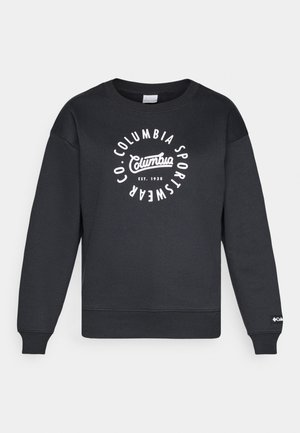 Fekete pulóver kerek nyakkal, bordázott mandzsettákkal és aljjal. Kör alakú fehér logóval rendelkezik, amelyen "Columbia Sportswear" felirat és az alapítás éve szerepel.